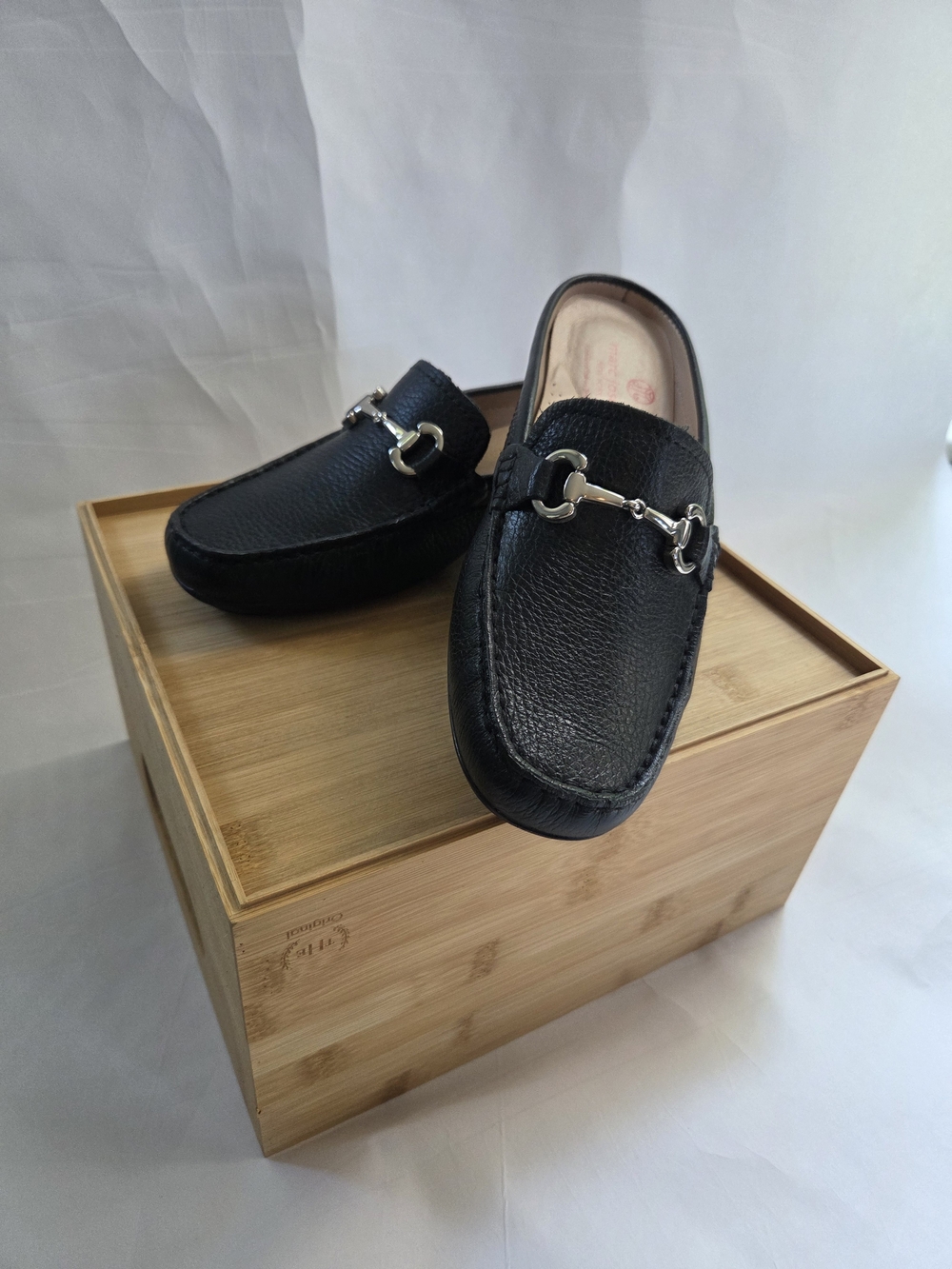 Size 8.5 Women's Black Leather Slip-On Loafers with Silver Buckle Detail